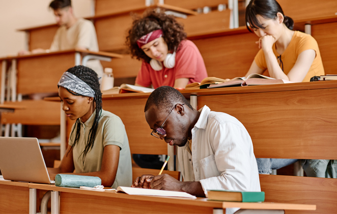 Photo of students working in a lecture hall