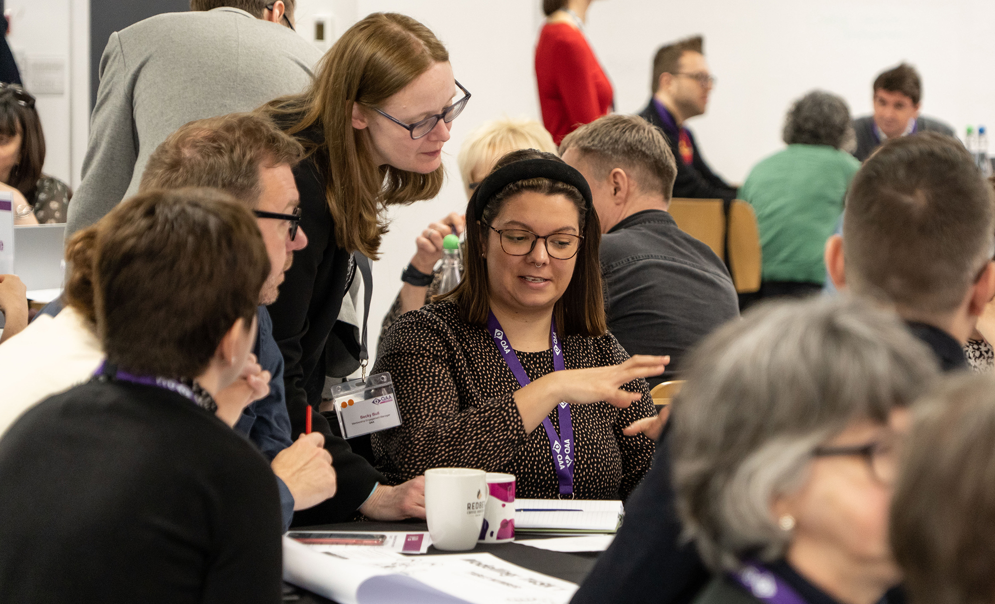 Group discussion at a QAA event