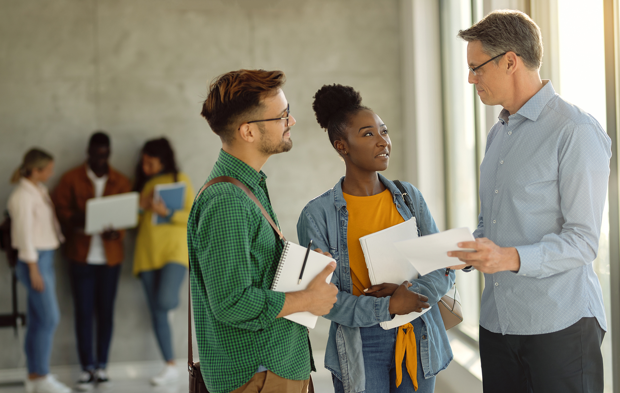 Students and tutor in conversation